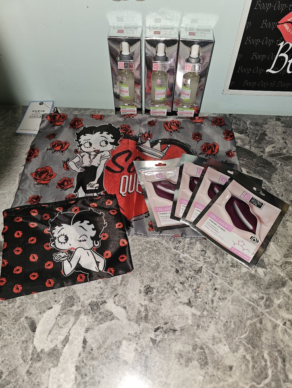 9pc Betty Boop Sassy Queen Tote, Cosmetic Pouch, 3 Serums & 4 Lip Masks!